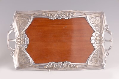 Lot 499 - A DUTCH ART NOUVEAU PEWTER AND MAHOGANY TRAY