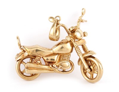 Lot 230 - A VINTAGE 9CT GOLD MOTORCYCLE PENDANT