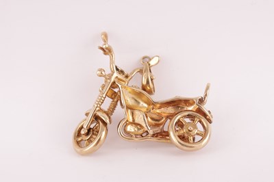 Lot 230 - A VINTAGE 9CT GOLD MOTORCYCLE PENDANT