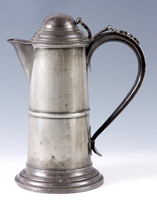 Lot 296 - A 19TH CENTURY LARGE PEWTER FLAGON of footed...