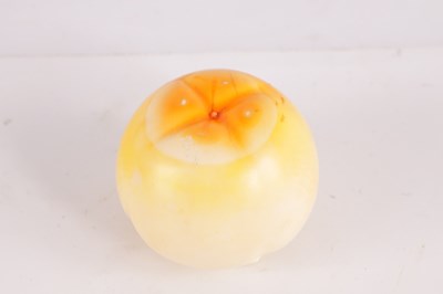 Lot 57 - A LATE 19TH CENTURY STAINED CARVED IVORY PERSIMMON FRUIT