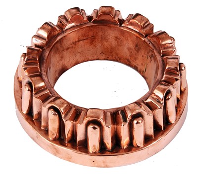 Lot 299 - A 19TH CENTURY LARGE SHALLOW COPPER RING MOULD...