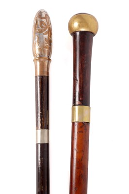 Lot 377 - TWO LATE 19TH CENTURY BRASS BOUND SWORD STICKS