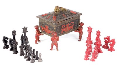 Lot 547 - A LATE 19TH CENTURY ENGLISH PAINTED LEAD CHESS SET IN THE ORIGINAL LEAD CASKET