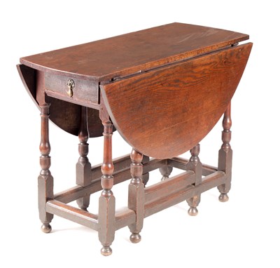 Lot 978 - AN 18TH CENTURY OAK GATE LEG TABLE OF SMALL SIZE