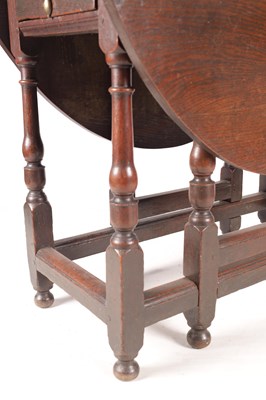Lot 978 - AN 18TH CENTURY OAK GATE LEG TABLE OF SMALL SIZE