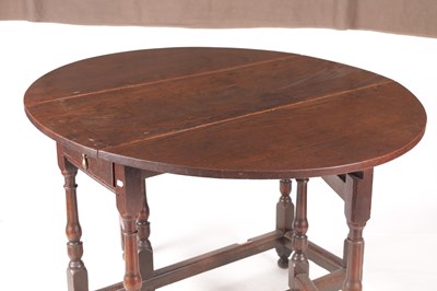 Lot 978 - AN 18TH CENTURY OAK GATE LEG TABLE OF SMALL SIZE