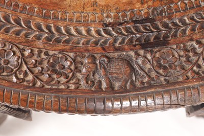 Lot 88 - A 19TH CENTURY ANGLO-INDIAN CARVED HARDWOOD OVAL OCCASIONAL TABLE