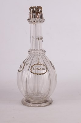 Lot 11 - A 19TH CENTURY FOUR SECTIONAL LIQUOR CLEAR GLASS DECANTER