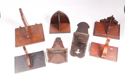 Lot 845 - A COLLECTION OF SEVEN 19TH CENTURY AND LATER CLOCK WALL BRACKETS