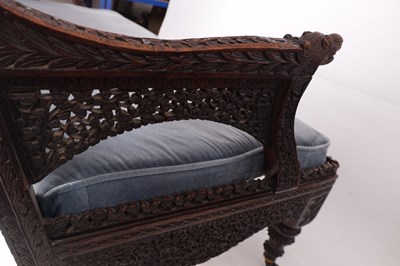 Lot 154 - A 19TH CENTURY ANGLO-INDIAN HARDWOOD THREE-SEATER SETTEE