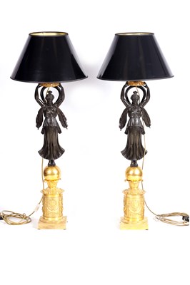 Lot 514 - A FINE PAIR OF EMPIRE GILT AND PATINATED BRONZE FIGURAL CANDELABRA CONVERTED TO LAMPS