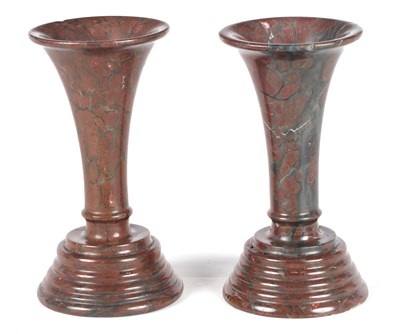 Lot 553 - A PAIR OF 19TH CENTURY RED SERPENTINE MARBLE VASES