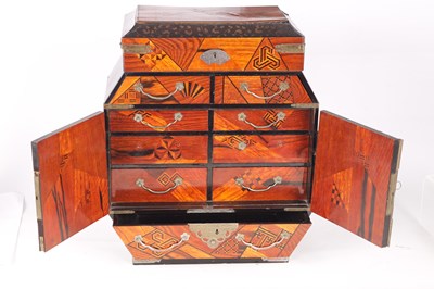 Lot 210 - A MEIJI PERIOD JAPANESE INALID AND LACQUER WORK JEWELLERY CABINET
