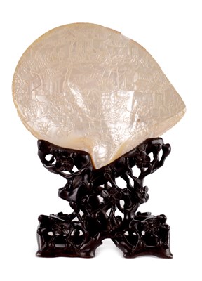 Lot 140 - A LATE 19TH CENTURY CHINESE CARVED SHELL ON HARDWOOD STAND