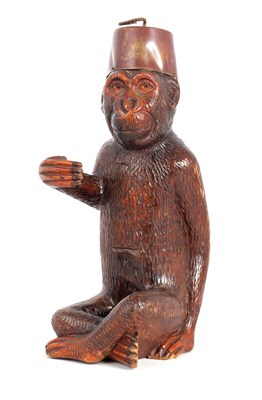 Lot 437 - A 19TH CENTURY BLACK FOREST CARVED MONKEY