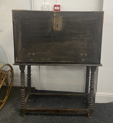 Lot 1093 - A 17TH CENTURY SPANISH IRON MOUNTED FRUITWOOD COLLECTORS CABINET ON STAND