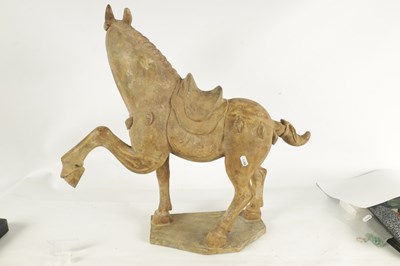 Lot 166 - A CHINESE EARTHENWARE MODEL OF A TANG HORSE