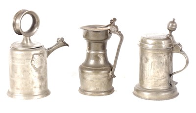 Lot 612 - A COLLECTION OF THREE EARLY LIDDED PEWTER VESSELS