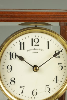 Lot 891 - EUREKA CLOCK CO. LTD. LONDON  AN EARLY 20th CENTURY ENGLISH MAHOGANY FIVE GLASS ELECTRIC MANTEL CLOCK