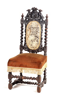 Lot 1156 - A VICTORIAN OAK SIDE CHAIR WITH ARMORIAL CREST HAVING HERALDIC  DOGS