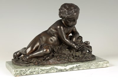 Lot 456 - A 19TH CENTURY BRONZE SCULPTURE OF A SEATED CHERUB HOLDING A BUTTERFLY