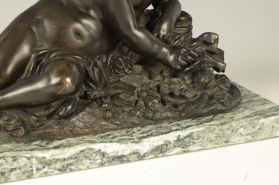 Lot 662 - A 19TH CENTURY BRONZE SCULPTURE OF A SEATED CHERUB HOLDING A BUTTERFLY