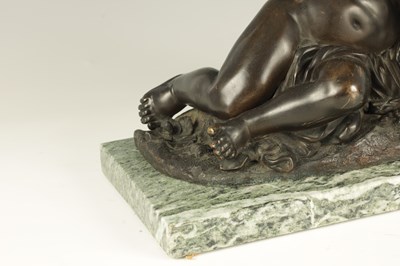 Lot 662 - A 19TH CENTURY BRONZE SCULPTURE OF A SEATED CHERUB HOLDING A BUTTERFLY