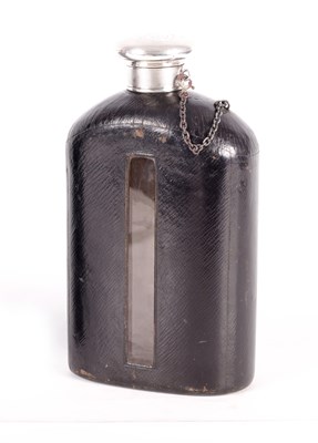 Lot 291 - A LATE 19TH CENTURY OVERSIZED SILVER AND LEATHER BOUND HIP FLASK