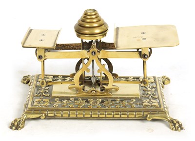 Lot 548 - A LATE 19TH CENTURY BRASS POSTAL SCALE