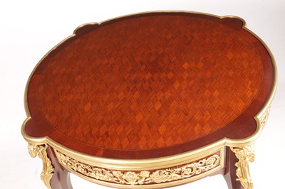 Lot 966 - A FINE EARLY 20TH CENTURY FRENCH CIRCULAR ORMOLU MOUNTED MAHOGANY AND ROSEWOOD PARQUETRY INLAID CENTRE TABLE IN THE MANNER OF FRANCOIS LINKE