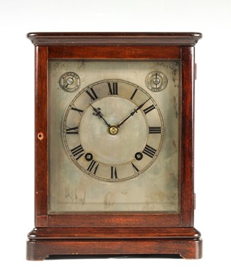 Lot 938 - AN EARLY 20TH CENTURY GERMAN MAHOGANY FOUR-GLASS QUARTER CHIMING MANTEL CLOCK