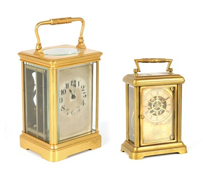 Lot 772 - TWO LATE 19TH CENTURY AMERICAN BRASS STRIKING CARRIAGE CLOCKS