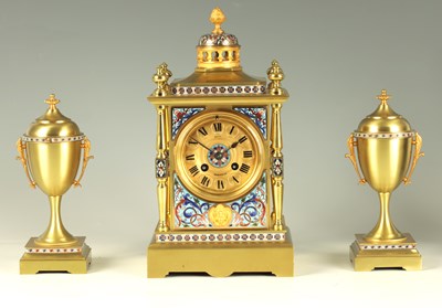 Lot 887 - A LATE 19TH CENTURY FRENCH CHAMPLEVE ENAMEL GILT BRASS CLOCK GARNITURE SET