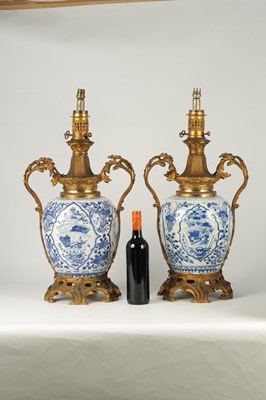 Lot 128 - A LARGE MATCHED PAIR OF 18TH CHINESE BLUE AND WHITE GINGER JARS, LATER CONVERTED TO LAMPS