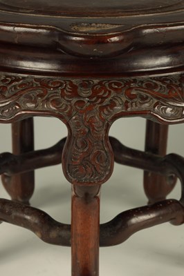Lot 201 - A 19TH CENTURY CHINESE HARDWOOD JARDINIERE STAND