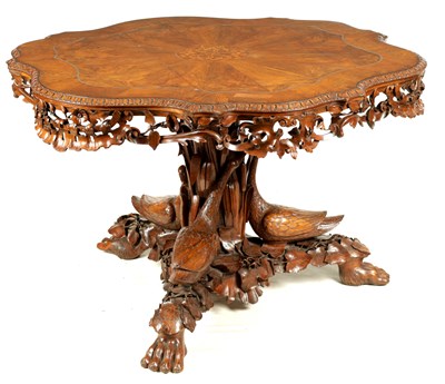Lot 1005 - A FINE EARLY 19TH CENTURY CONTINENTAL FIGURED WALNUT CARVED CENTRE TABLE