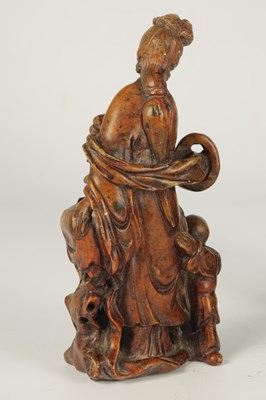 Lot 137 - A CHINESE CARVED SOAP STONE FIGURAL STATUE