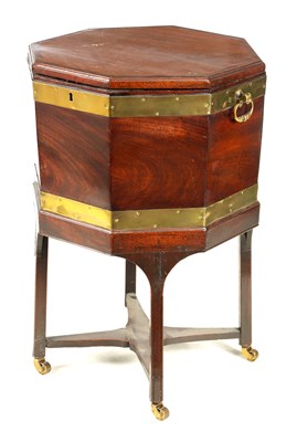 Lot 1066 - A GEORGE III MAHOGANY OCTAGONAL CELLARETTE