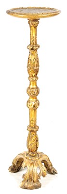 Lot 1039 - AN EARLY 18TH CENTURY CARVED GILT GESSO TORCHERE