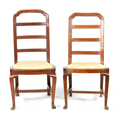 Lot 1095 - AN UNUSUAL PAIR OF EARLY 18TH CENTURY WALNUT SIDE CHAIRS