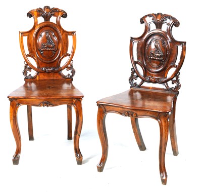 Lot 1051 - A PAIR OF 19TH CENTURY YEW WOOD HALL CHAIRS