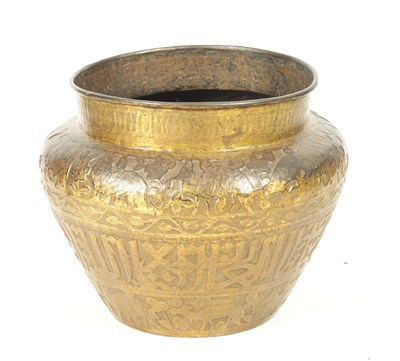 Lot 177 - A 19TH CENTURY EMBOSSED GILT BRASS INDIAN JARDINIERE