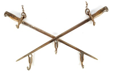 Lot 493 - A NOVELTY COAT HOOK MADE FROM TWO 19TH CENTURY BAYONETS