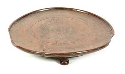 Lot 653 - AN EARLY 17TH CENTURY WALNUT TREEN WARE TRAY