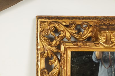 Lot 1028 - AN IMPRESSIVE 18TH CENTURY CARVED GILTWOOD IRISH STYLE HANGING MIRROR