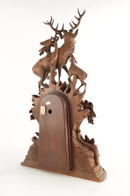 Lot 794 - A LARGE LATE 19TH CENTURY CARVED BLACK FOREST MANTEL CLOCK