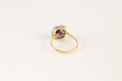 Lot 240 - A LADIES 18CT GOLD AND PLATINUM GARNET AND DIAMOND RING