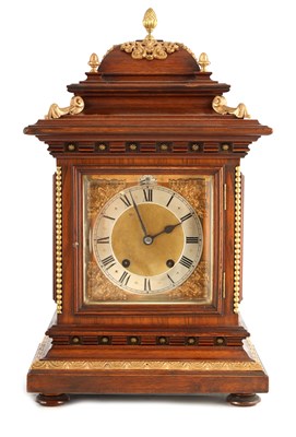 Lot 942 - A LATE 19TH CENTURY GERMAN WALNUT ORMOLU MOUNTED BRACKET CLOCK