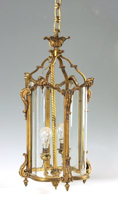 Lot 588 - A 20TH CENTURY REGENCY STYLE HANGING HALL LANTERN OF SERPENTINE  SHAPE